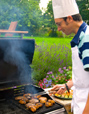 Man barbecuing.